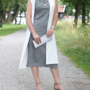 Lovely silver clutch/wristlet. Chain